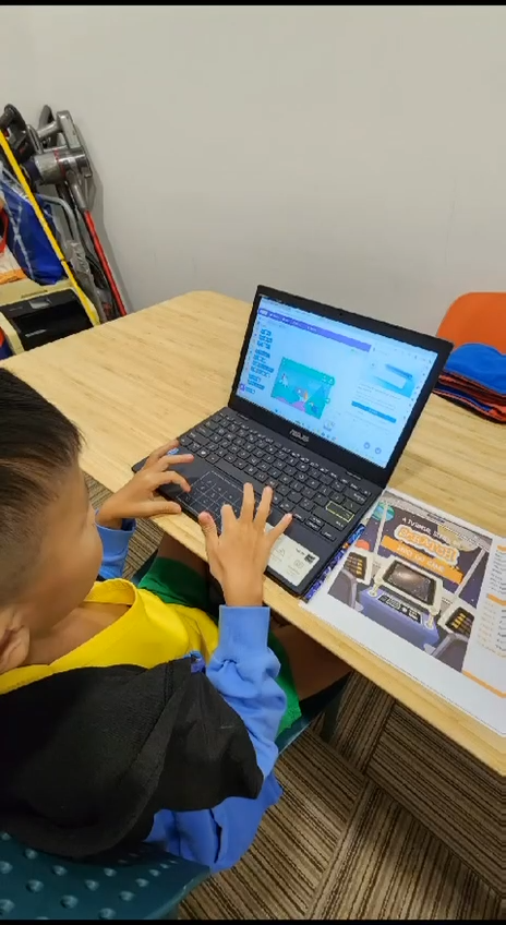 Student coding on a laptop — Bespoke Learning Centre Coding & Robotics